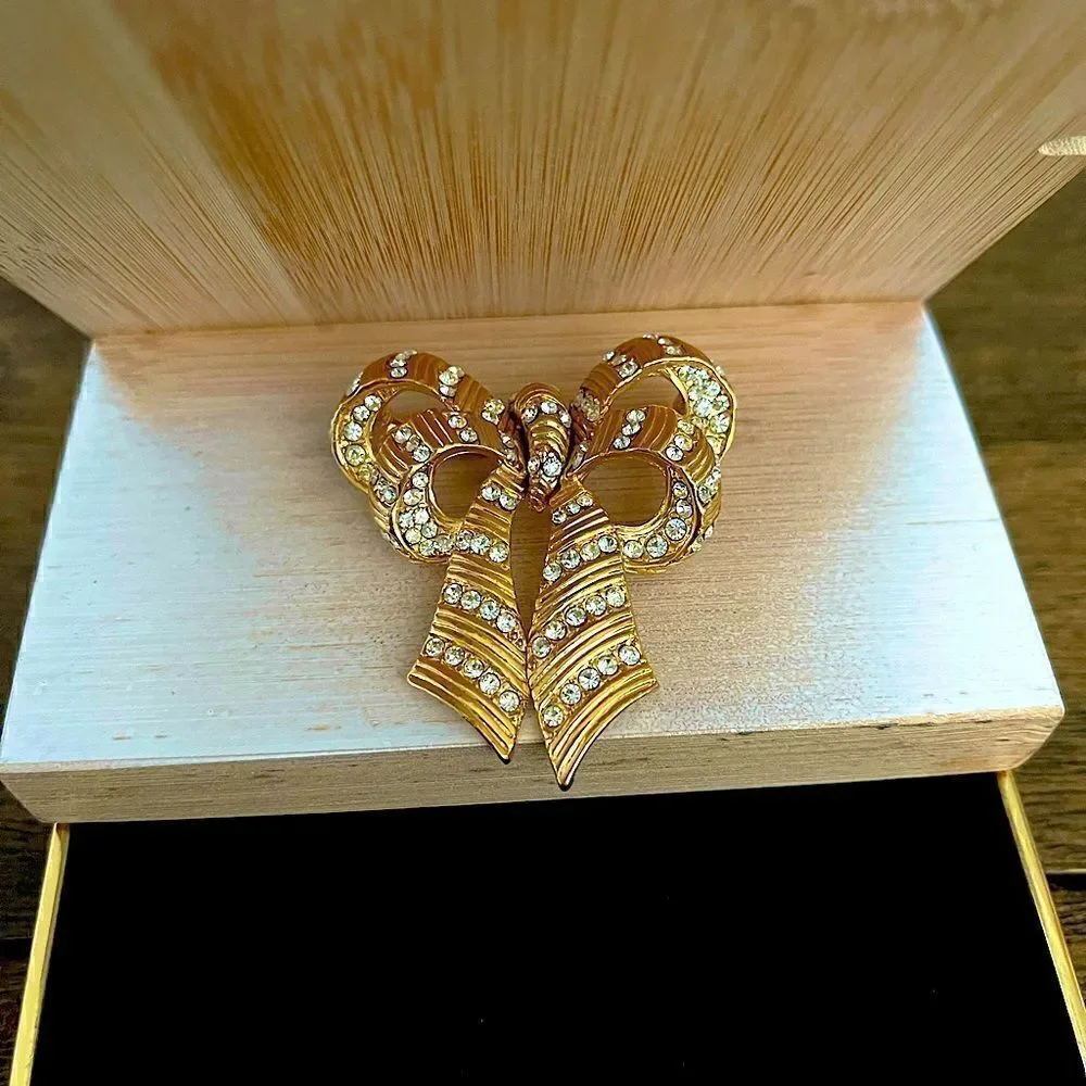 Gold tone vintage cz bow statement brooch